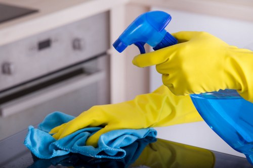 Sanitation of high-touch surfaces in a business environment
