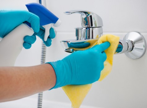 Cleaner preparing a London property for final inspection
